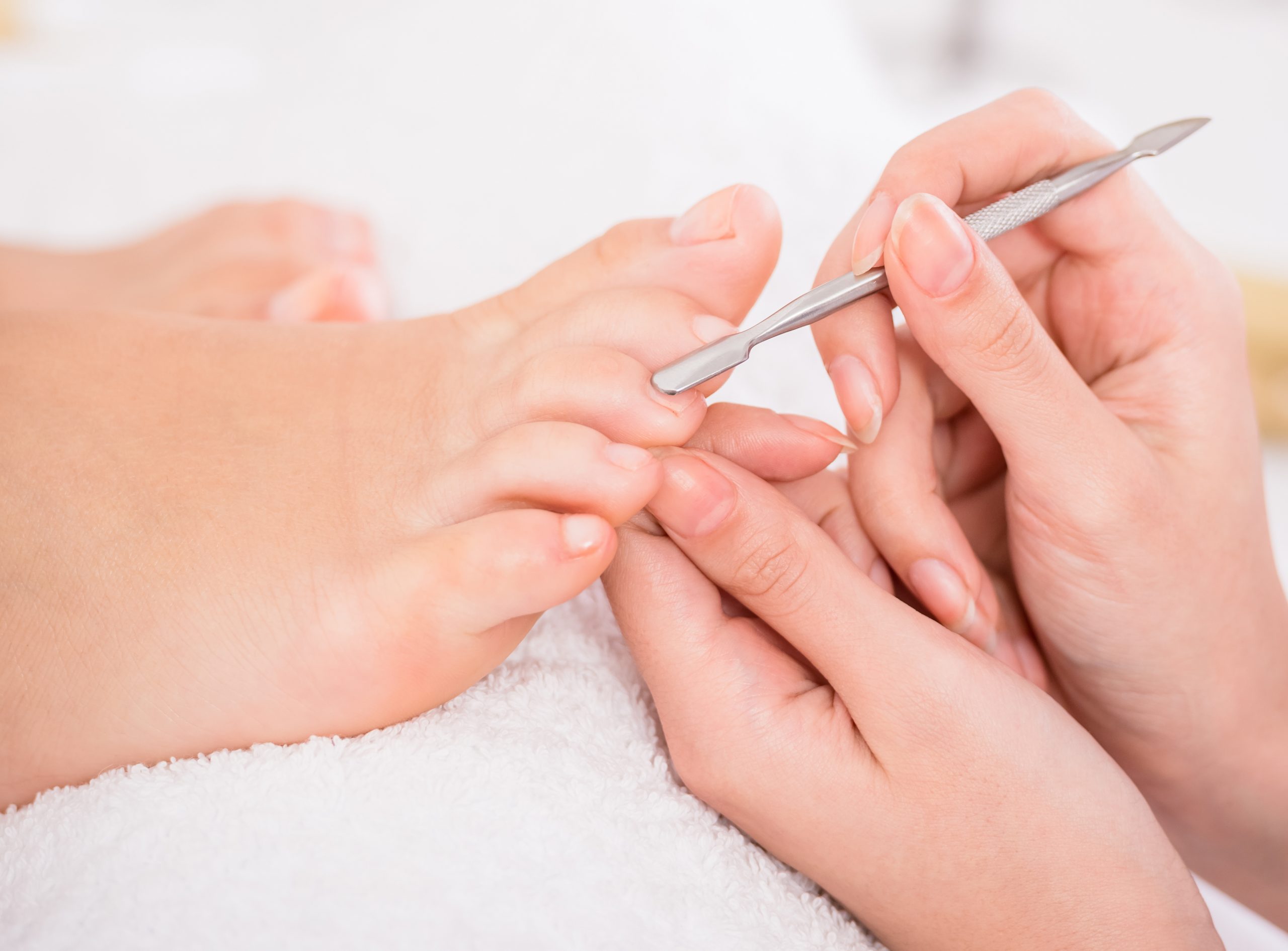 Careful pedicure work at Seacliff Nail Studio